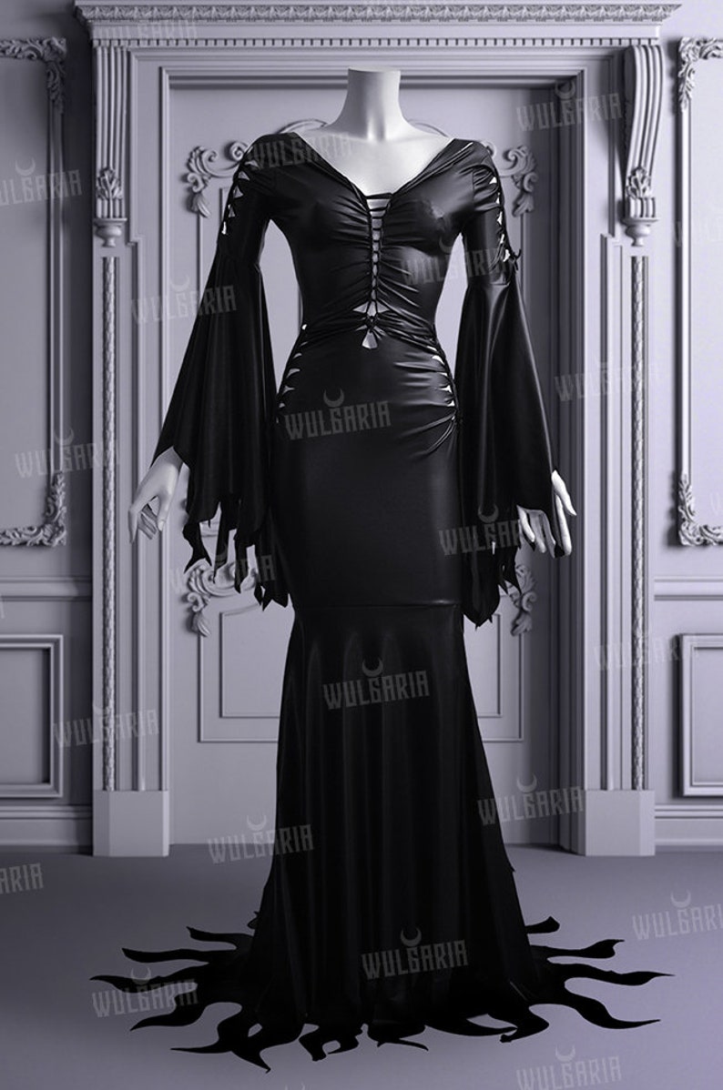 Gothic black wedding dress displayed with tattered sleeves