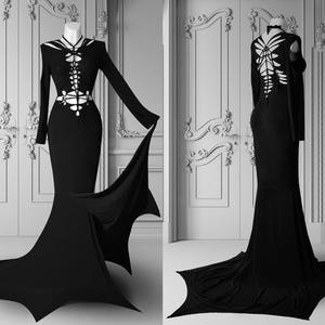 Black gothic hourglass wedding dress – fantasy fitted gown with skeleton corset illusion, long train & witchy elopement style