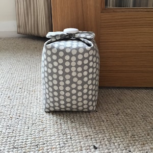 Grey and white spot Door stop (filled)