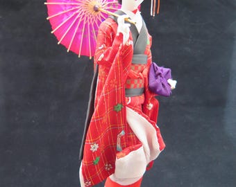 Vintage Japanese geisha doll