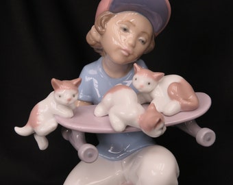 Lladro "Little Riders" #7623 figurine - Boy with skateboard