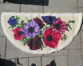 Latch hooked floral rug