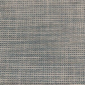 May include: Close-up of a textured fabric with a blue and white pattern. The fabric has a woven appearance and a subtle sheen.
