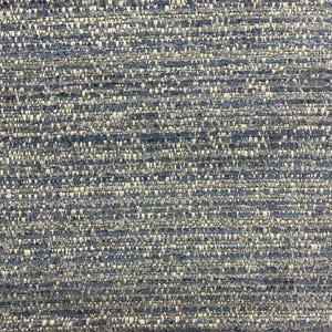 May include: Close-up of a textured fabric with a blue and beige colour scheme. The fabric has a subtle striped pattern.