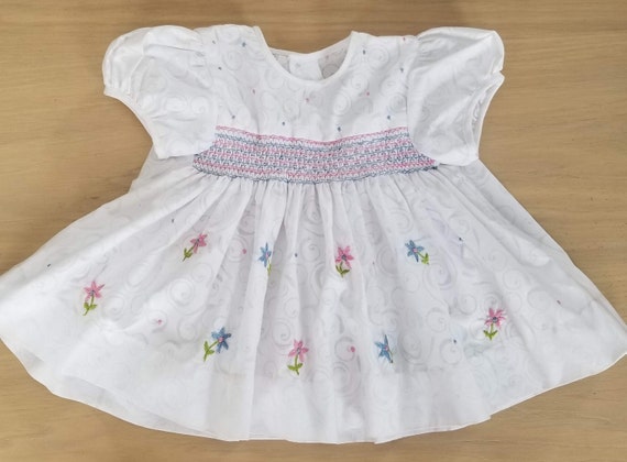 white dress with pink and blue flowers