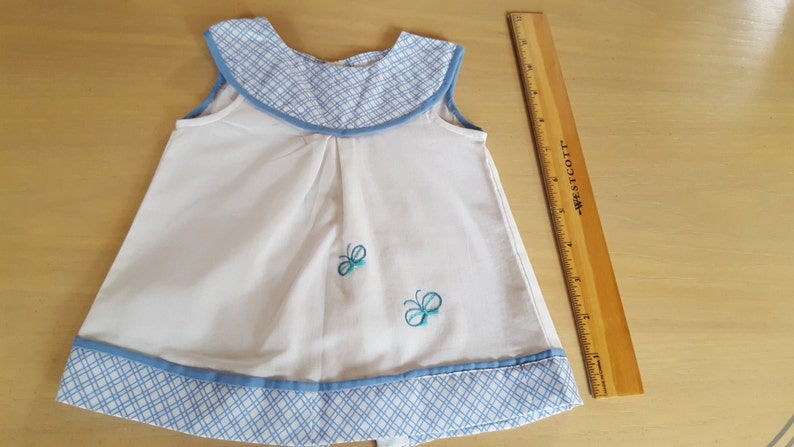 Beautiful soft cotton baby girl butterfly motif dress with hand embroidered butterflies. 0-3 months Summer dress