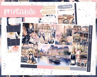May include: Printable planner stickers with a Parisian theme. The design features watercolor illustrations of the Eiffel Tower, fashion accessories, a poodle, and a river scene. The text "printable" is displayed in pink.