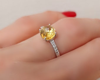 Anillo de plata 925 rodiada, pavé de citrino redondo y topacio incoloro