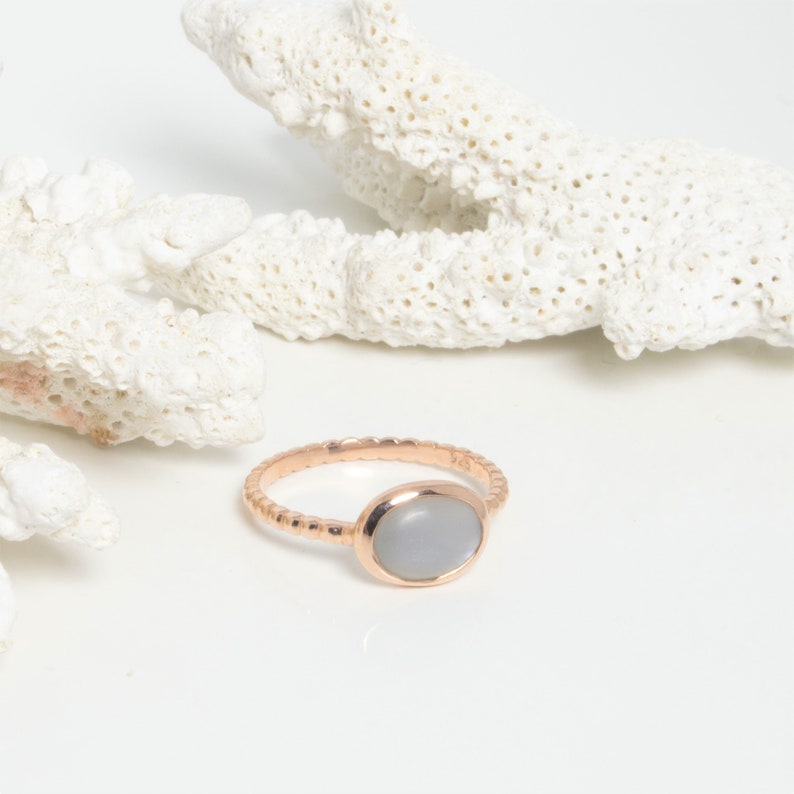 Golden silver ring and grey moonstone