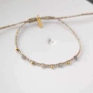 Adjustable golden braided wire and labradorite bracelet