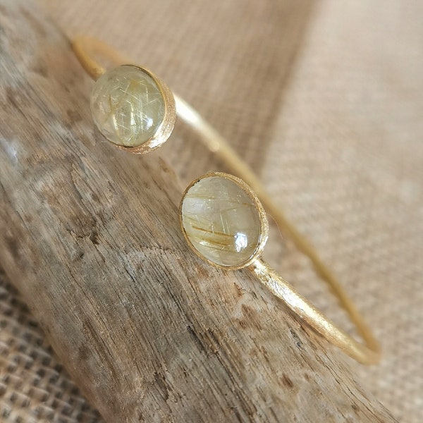 Open bangle bracelet in gold-plated silver and rutilated quartz cabochon