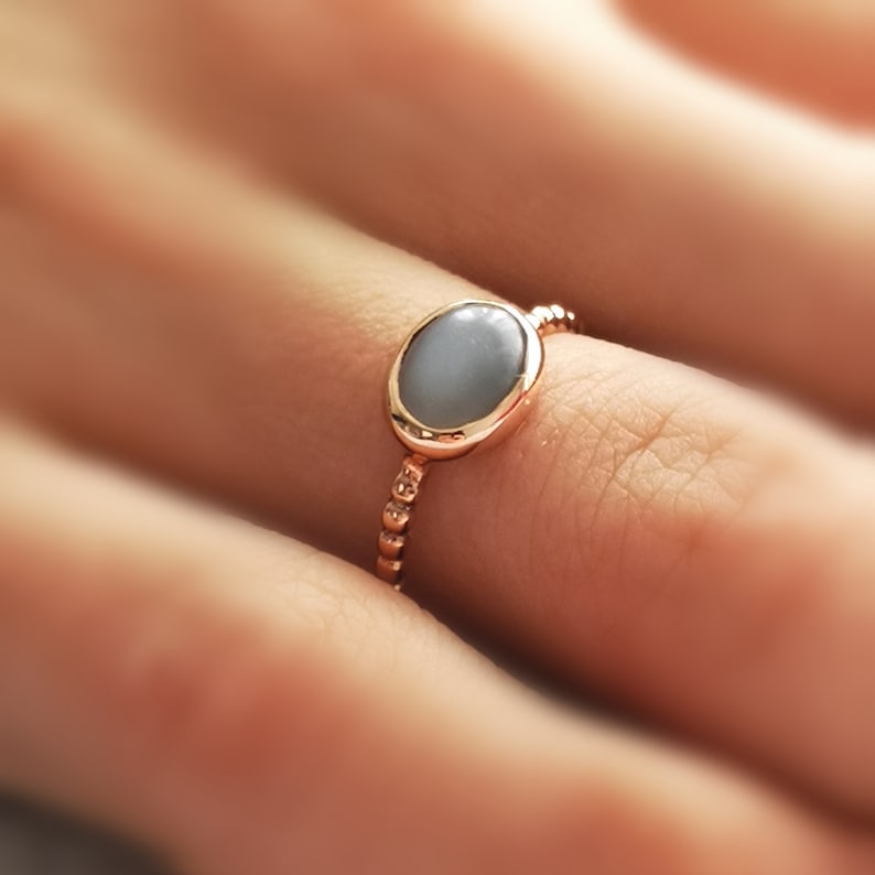 Golden silver ring and grey moonstone
