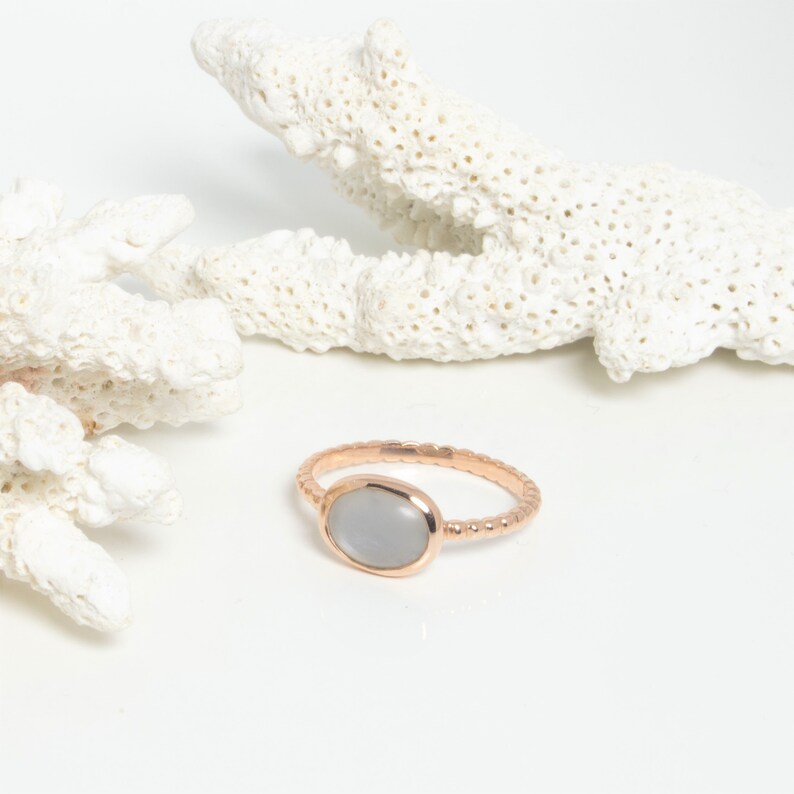 Golden silver ring and grey moonstone