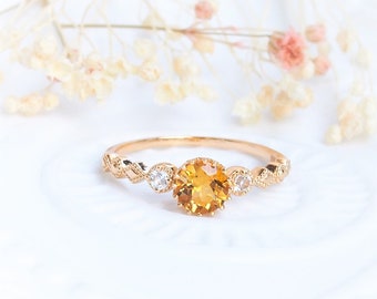 Delicate ring in gilded 925 silver, citrine and colorless topazes