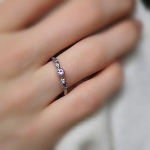 Rhodium-plated 925 silver ring set with small lavender amethysts