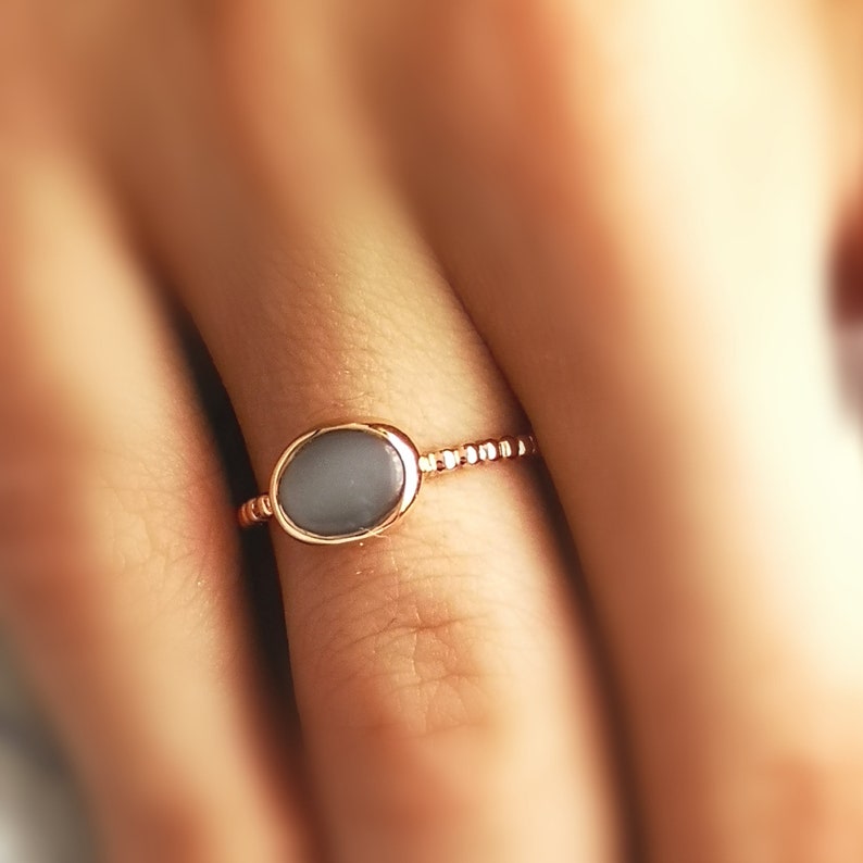 Golden silver ring and grey moonstone