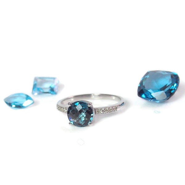 Bague Solitaire argent rhodié, topaze blue london et diamants