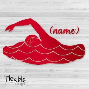 May include: A red graphic of a swimmer in the freestyle stroke, with the word "(name)" in cursive. The swimmer is depicted in a streamlined position, with the arm extended forward. The image also includes the text "Flexible designs".