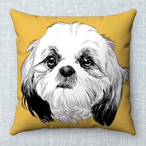 May include: A yellow throw pillow with a black and white illustration of a Shih Tzu dog's face.