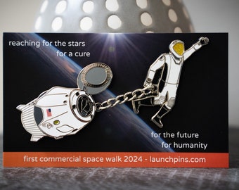 1ère épinglette commerciale de célébration de la marche spatiale