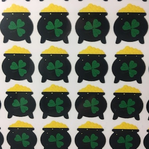 Pot met goud stickervel - 69 gelamineerde vinylstickers