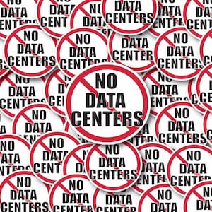 May include: A collection of circular stickers featuring a white background with a red border and a red diagonal slash. The text NO DATA CENTERS is printed in bold black capital letters in the center of each sticker, indicating a prohibition.