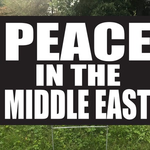 May include: Black and white yard sign with the text "PEACE IN THE MIDDLE EAST".