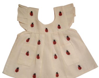 Beige Baby Dress with Ladybug Embroidery – Handmade in Oaxaca
