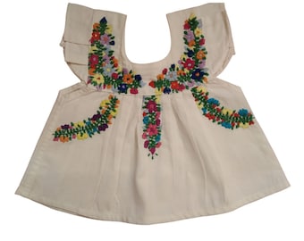 Handgemaakte beige babyjurk – veelkleurige bloemenborduursel – San Antonino Oaxaca-jurk