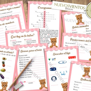 May include: Pink and white baby shower game cards featuring a brown teddy bear illustration. The cards include games such as "Who Knows Mummy Best?", "Baby Animal Guessing Game", and "What's in Your Purse?"