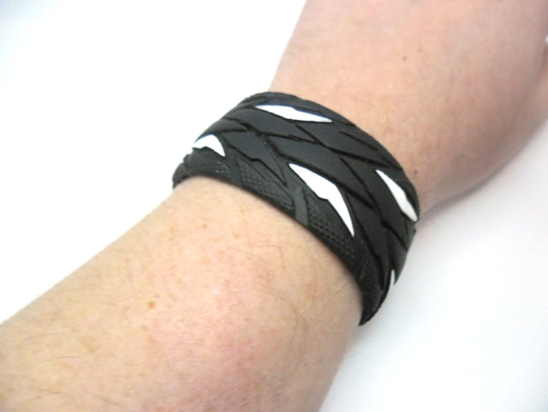 Bracelet made from recycled bicycle tires.