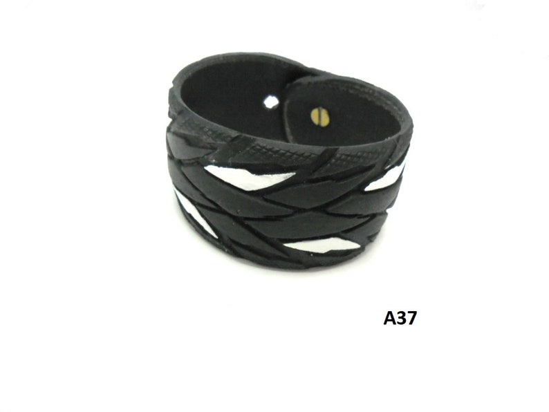 Bracelet made from recycled bicycle tires.
