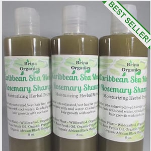 May include: Three clear plastic bottles of Brina Organics Caribbean Sea Moss Rosemary Shampoo, each containing 8 oz. of olive-green liquid. The white labels feature green text, leaf illustrations, and instructions for use on wet hair.