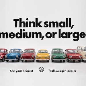 May include: A collection of seven miniature Volkswagen toy vehicles in red, blue, yellow, green, and cream colours, arranged in a row. The text above reads Think small, medium, or large. Below is the Volkswagen logo and See your nearest Volkswagen dealer.