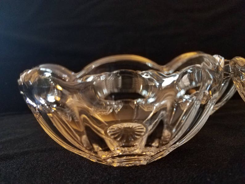 Set of four Heisey ColonialOld Williamsburg clear nappies 4 34 in diameter and 2 inches in height