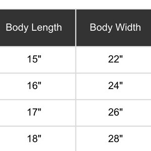 May include: Size chart for a toddler's clothing item, showing measurements in inches for sizes 2T, 3T, 4T, and 5T. The chart includes body length, body width, and sleeve length.
