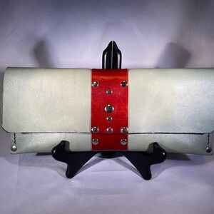 M7 Seafoam Wristlet/Clutches With Decorative Strips and Rivets