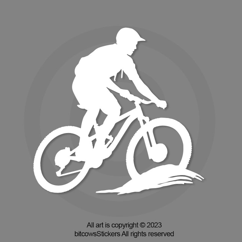 May include: White silhouette of a person riding a mountain bike on a dirt path. The rider is wearing a helmet and is in mid-air.