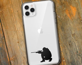 May include: A clear phone case with a black silhouette of a person aiming a rifle. The case is designed for an iPhone.