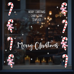 K&ouml;nnte beinhalten: Fensterdekoration mit Zuckerstangen- und Sternaufklebern. Die Zuckerstangen sind rot und wei&szlig; mit rosa Schleifen. Die Worte "Merry Christmas" und "Candy Cane Template" sind in wei&szlig;er Schrift geschrieben.