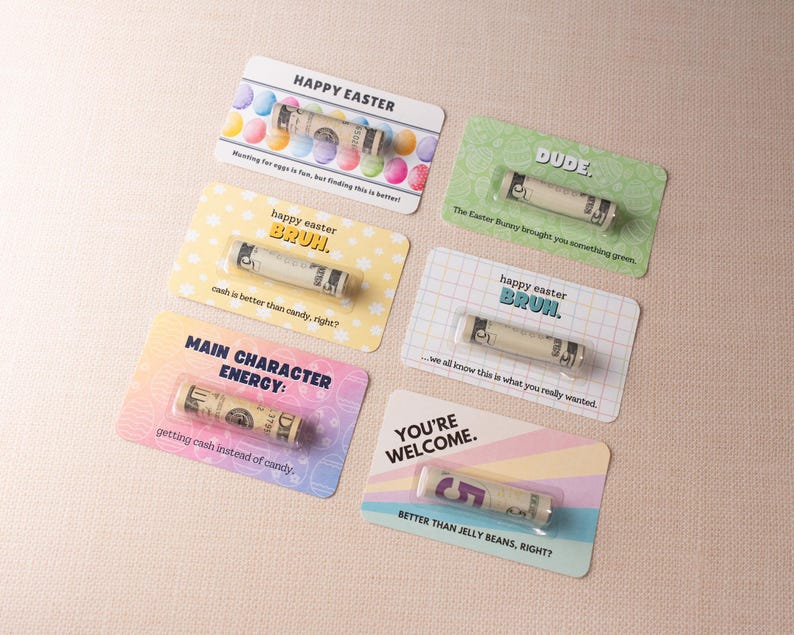 May include: Five colorful cards with Easter-themed messages and rolled-up dollar bills inside. The cards have messages like "Happy Easter", "Dude", "Happy Easter, Bruh", "Main Character Energy", and "You're Welcome".