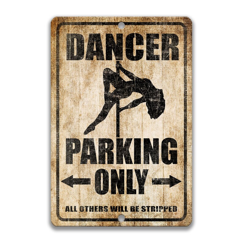 May include: A vintage-style metal sign with a distressed background. It features a silhouette of a woman on a pole dance pole with the text "Dancer Parking Only" and the smaller text "All others will be stripped".