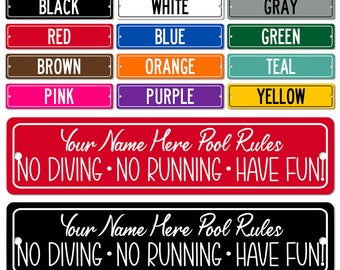 May include: A set of 12 pool rules signs in various colors, including black, white, gray, red, blue, green, brown, orange, teal, pink, purple, and yellow. Each sign has the text "Your Name Here Pool Rules" and "NO DIVING NO RUNNING HAVE FUN!" in white lettering.