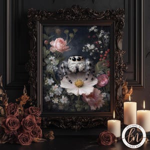 a framed painting of a spider sitting on a flower, surrounded by a floral arrangement and candles.