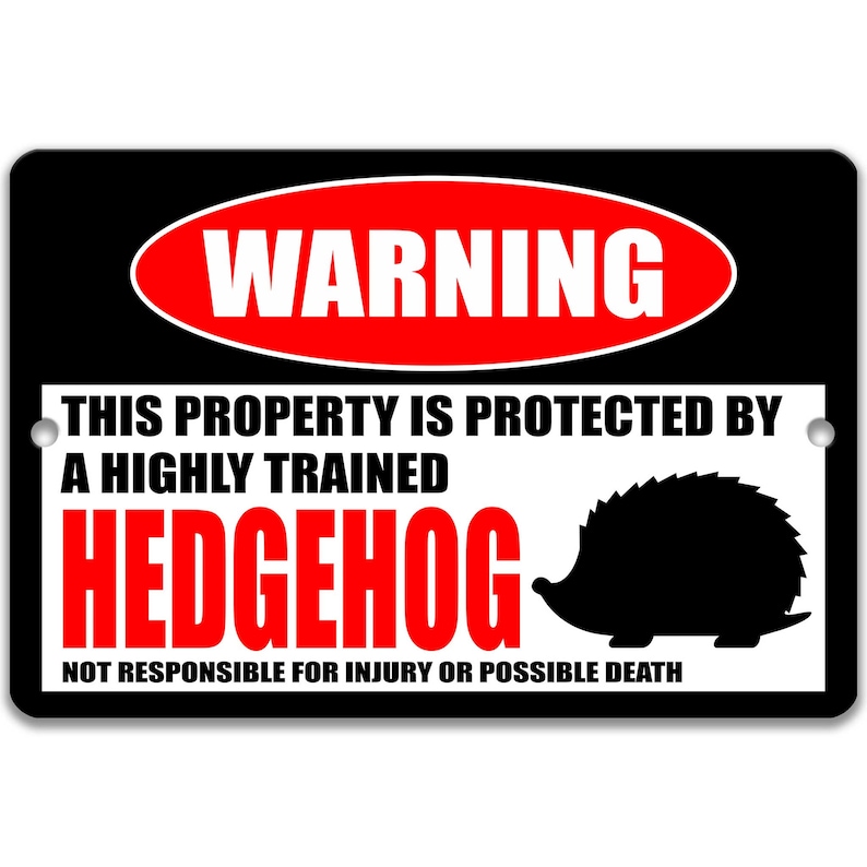 May include: Black and white warning sign with red text that reads "WARNING" in a red oval. The sign says "This property is protected by a highly trained HEDGEHOG. Not responsible for injury or possible death." A black silhouette of a hedgehog is shown on the sign.