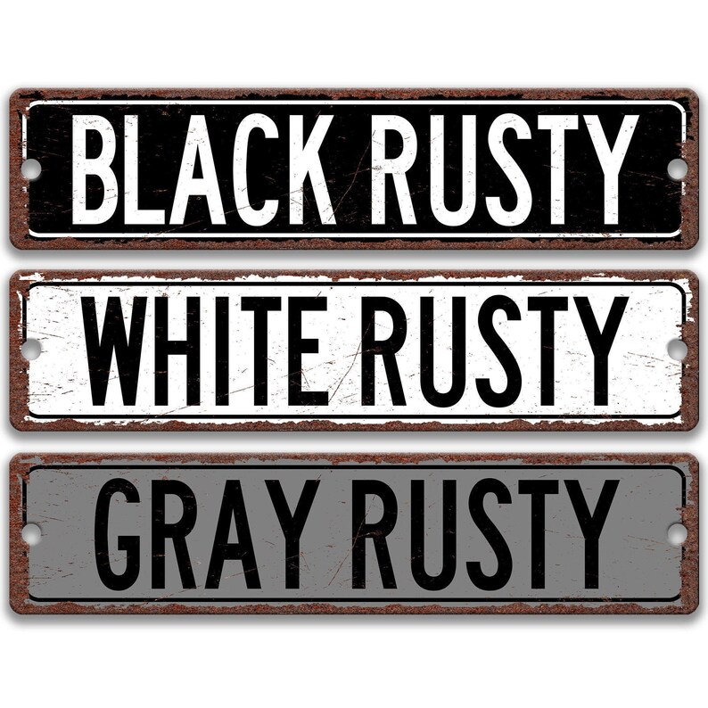 three signs with the text "BLACK RUSTY WHITE RUSTY GRAY RUSTY" written on them.