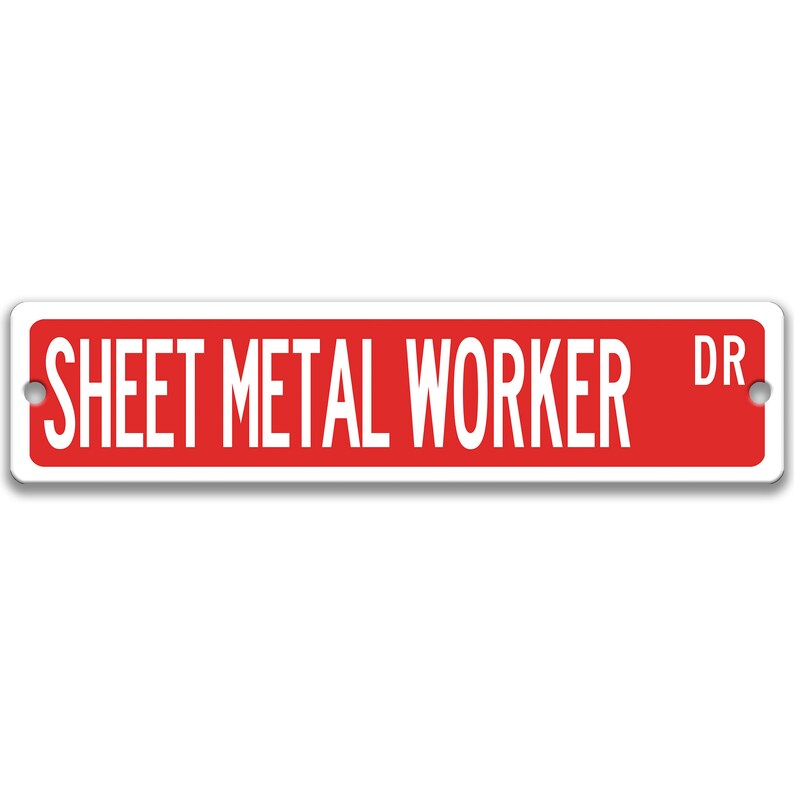 May include: A rectangular street sign with a red background and white text that reads "SHEET METAL WORKER DR". The sign has a white border and two pre-drilled holes for mounting.