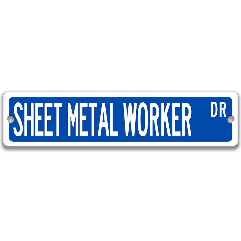 May include: A rectangular blue sign with white text reading "SHEET METAL WORKER DR". The sign has a white border and two pre-drilled holes for mounting.