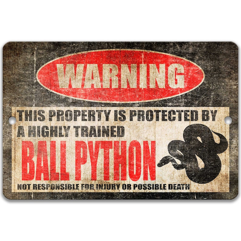 May include: A warning sign with a distressed, vintage look. It reads "WARNING THIS PROPERTY IS PROTECTED BY A HIGHLY TRAINED BALL PYTHON NOT RESPONSIBLE FOR INJURY OR POSSIBLE DEATH". The sign has a red circle with the word "WARNING" in white text. A black silhouette of a snake is in the bottom right corner.