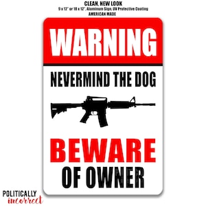 May include: Rectangular aluminum sign with a red and white background. The sign reads "WARNING" at the top, followed by "NEVERMIND THE DOG" and "BEWARE OF OWNER". A black silhouette of a rifle is in the center. The sign is American made.